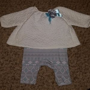 One piece winter outfit.